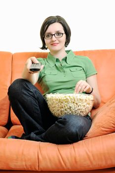 young woman eat popcorn, watching movies and eat popcor isolated on white