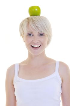 happy young woman eat green apple isolated  on white backround in studio