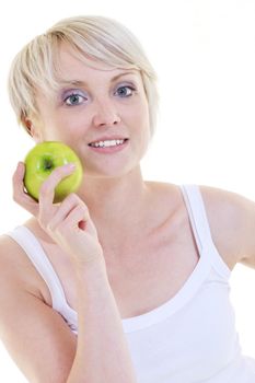 happy young woman eat green apple isolated  on white backround in studio
