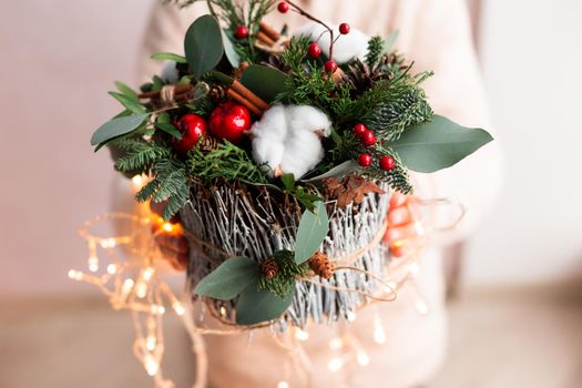 Christmas decoration with carnations, chrysanthemums santini, brunia and fir. Christmas spirit and mood