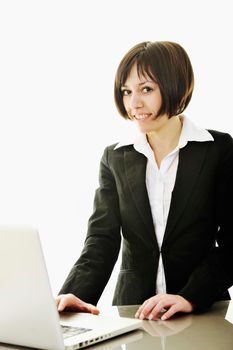 one young business woman isolated on white working on laptop computer