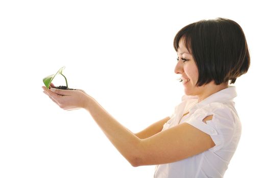 young business woman isolated on white holding green plant with small leaf and waiting to grow