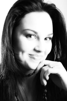 one brunette woman posing in studio 