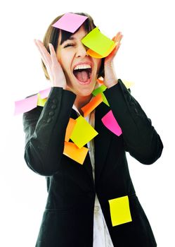 one frustrated young business woman with many of post it representing concept memory and frustration on work