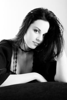 one brunette woman posing in studio 