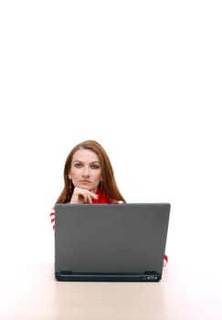 woman in red working on laptop at bright  office