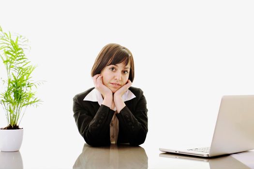 one young business woman isolated on white working on laptop computer