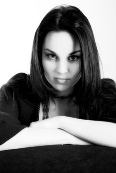 one brunette woman posing in studio 