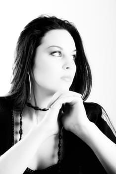 one brunette woman posing in studio 