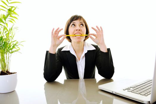 one young business woman isolated on white working on laptop computer