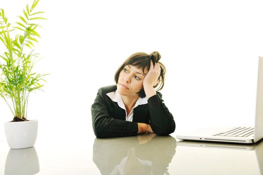 one young business woman isolated on white working on laptop computer