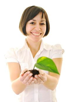 young business woman isolated on white holding green plant with small leaf and waiting to grow