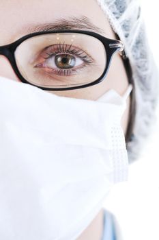 young adult nurse woman face with maskand eyeglasses  closeup 