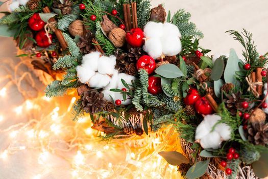 Christmas decoration with carnations, chrysanthemums santini, brunia and fir. Christmas spirit and mood