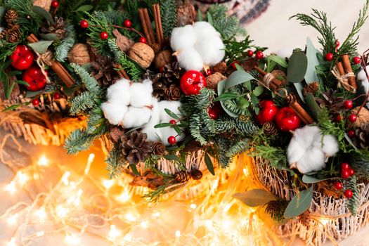 Christmas decoration with carnations, chrysanthemums santini, brunia and fir. Christmas spirit and mood