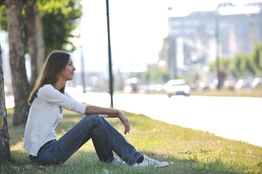 beautiful young woman have fun and relax at city street on beautiful sunny day