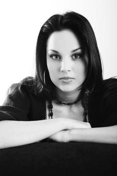 one brunette woman posing in studio 