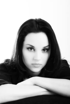 one brunette woman posing in studio 