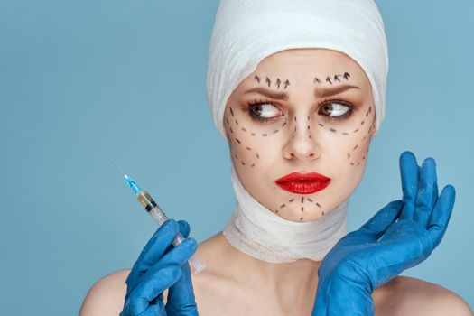 a person posing in blue gloves red lips surgery facial rejuvenation studio lifestyle. High quality photo