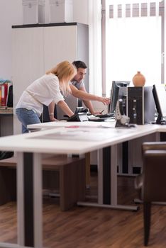 young designers in the creative office at the wooden furniture manufacture