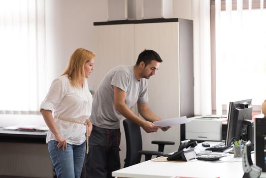 young designers in the creative office at the wooden furniture manufacture