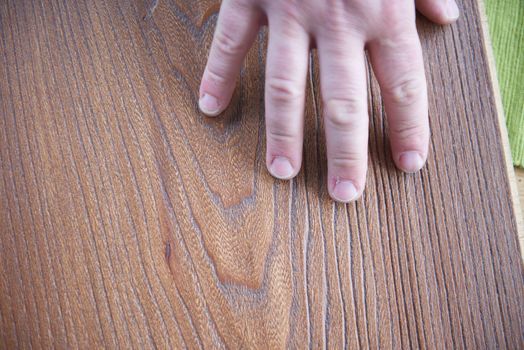 wood floor parquet shop selecting variants hands closeup