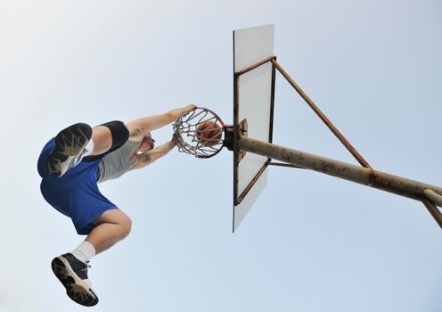 basketball player practicing and posing for basketball and sports athlete concept