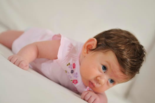 cute little baby indoor closeup portrait