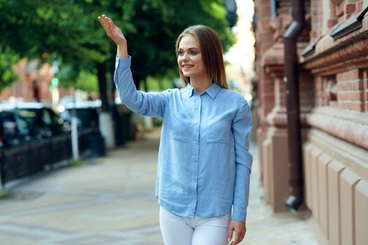 Business woman in a cafe outdoors fresh air summer. High quality photo