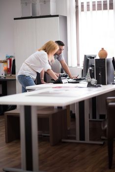 young designers in the creative office at the wooden furniture manufacture