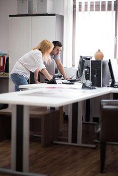 young designers in the creative office at the wooden furniture manufacture