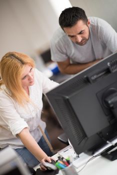 young designers in the creative office at the wooden furniture manufacture