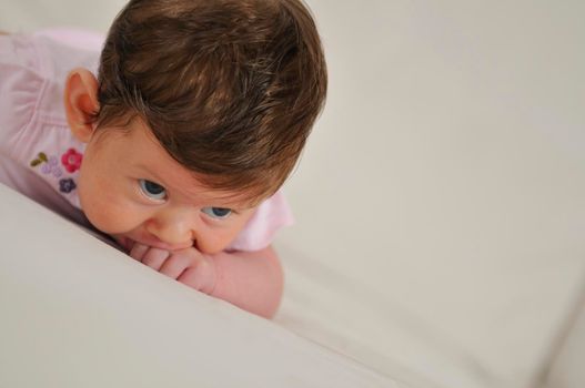 cute little baby indoor closeup portrait