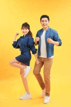 Full length shot of jumping couple having fun together