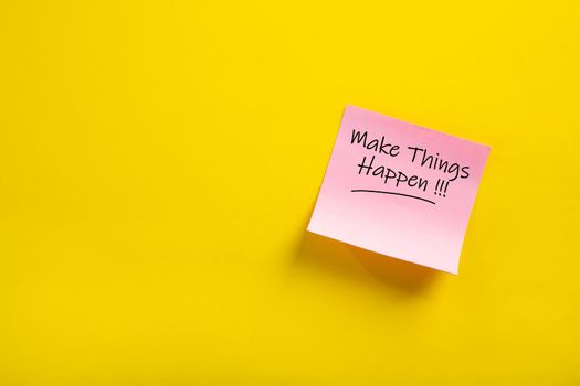 sticky note with make things happen word on yellow background
