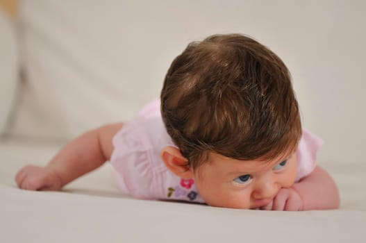 cute little baby indoor closeup portrait