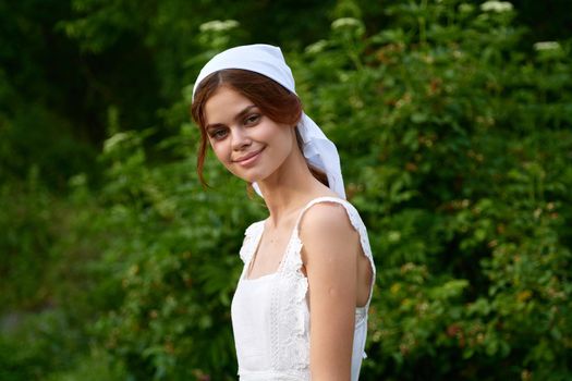 Woman in white dress countryside village nature ecology. High quality photo