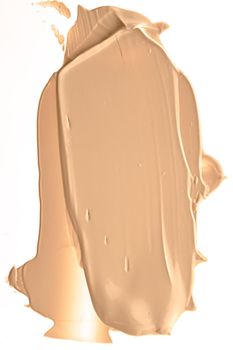 Beige beauty cosmetic texture isolated on white background, smudged makeup emulsion cream smear or foundation smudge, crushed cosmetics product and paint strokes.