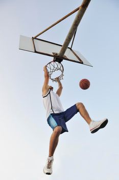 basketball player practicing and posing for basketball and sports athlete concept