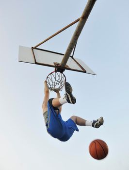 basketball player practicing and posing for basketball and sports athlete concept