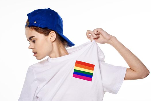 woman wearing white t-shirt lgbt flag inventor community. High quality photo