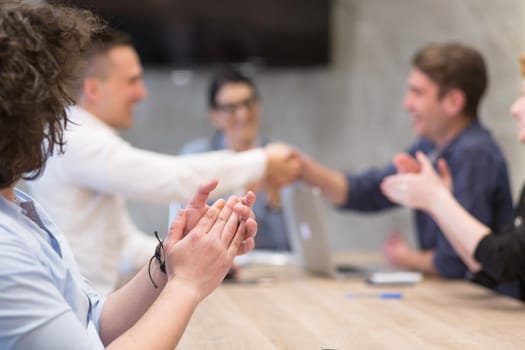 Business Partner Shake Hands on meetinig in modern office building