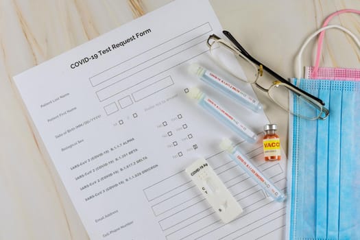 Tube containing swab sample for coronavirus new mutation Omicron COVID-19 test in laboratory the has tested positive