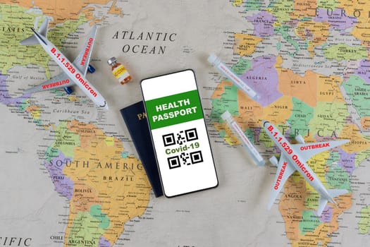 Smartphone with a digital of Covid-19 health vaccination passport a tube containing a swab sample for South African variant with new mutation coronavirus Omicron