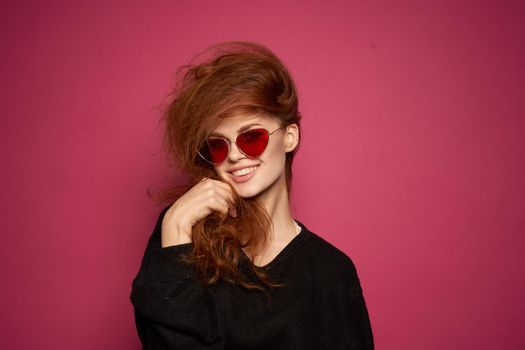 pretty woman fashionable hairstyle sunglasses posing Studio Model. High quality photo