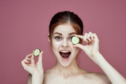 cheerful woman cucumbers vitamins clean skin health. High quality photo