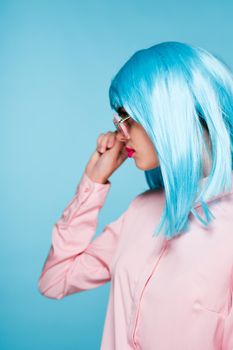 beautiful woman in blue wig sunglasses Glamor fashion. High quality photo