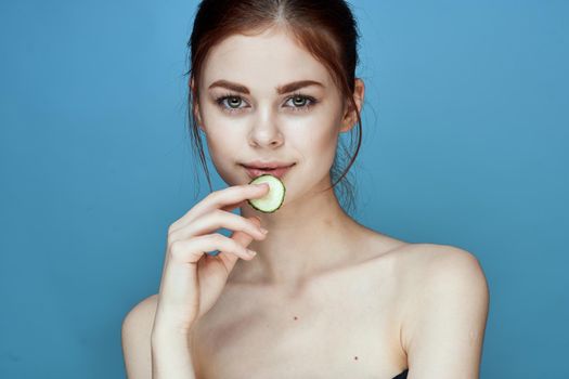 pretty woman with cucumber drink health vitamins. High quality photo