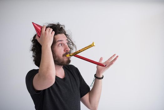 young man on party celebrating new year and dancing