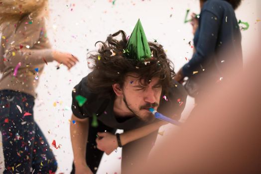 confetti party happy young people group celebrating new year eve while dancing and have fun at home